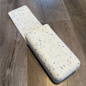 White and Black Speckled Hair Straightener Holder for Bathroom